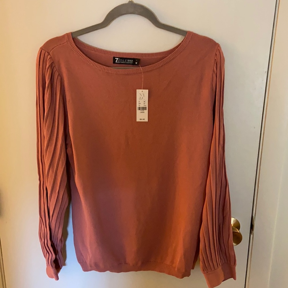 Pleated long sleeve top, great for work or fun!
